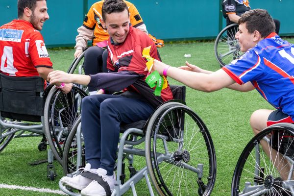 young men playing wheelchair sport