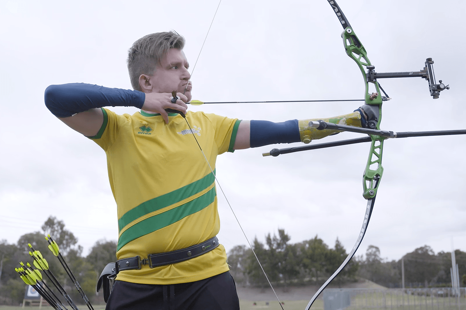 Paralympic archer Taymon Kenton-Smith prepares to release an arrow.