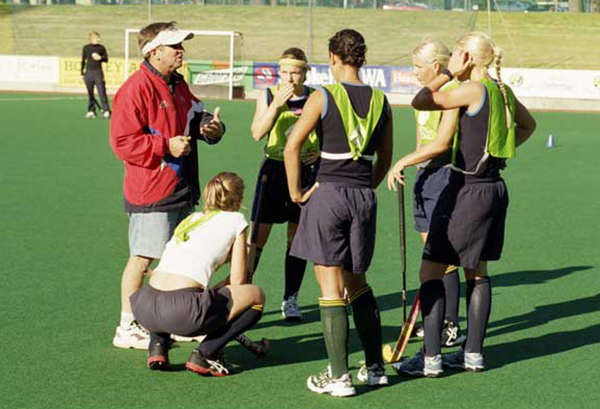 AIS Hockey coach speaking to athletes