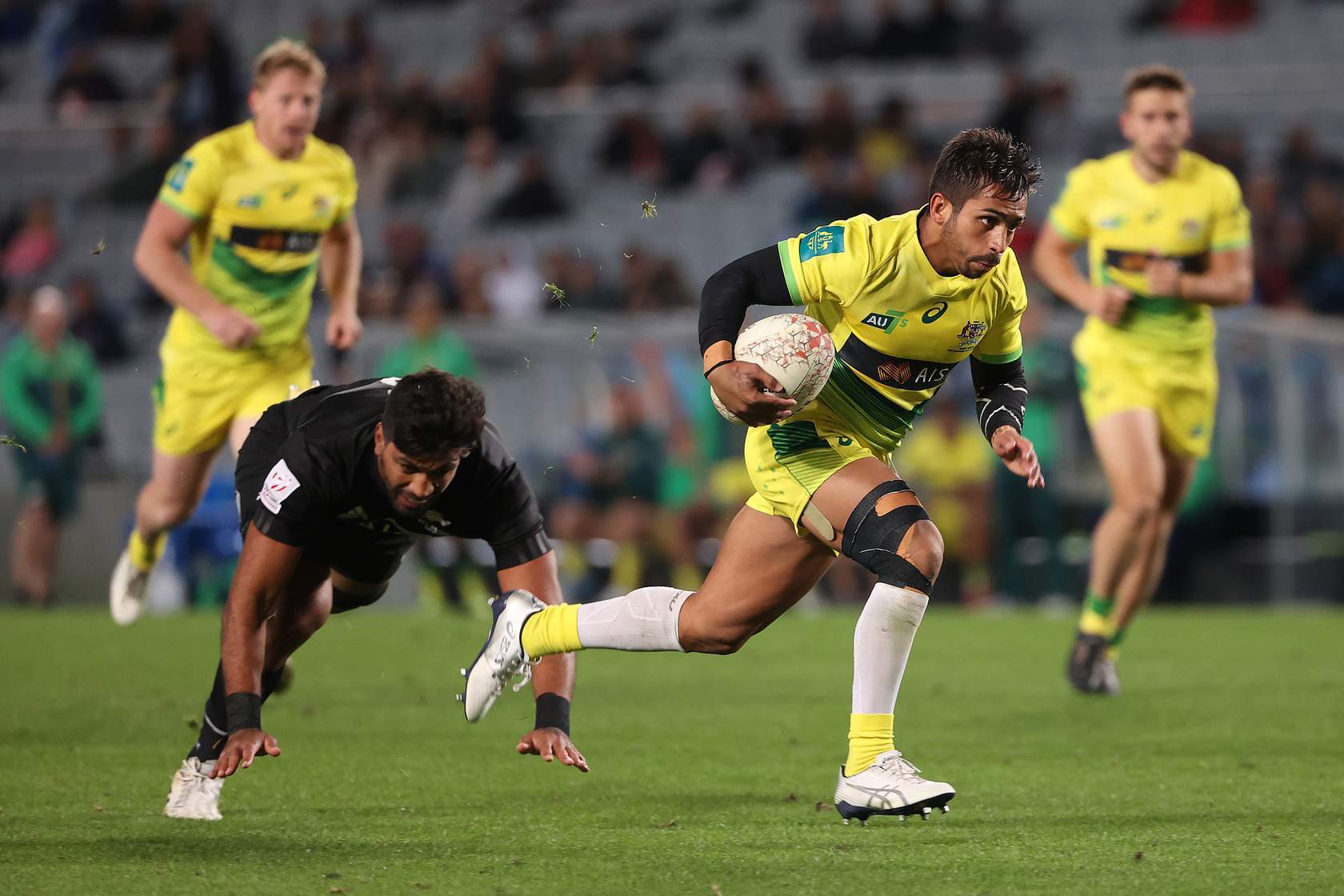 Maurice Longbottom Rugby player running with ball