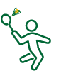 A person playing badminton hitting a shuttlecock