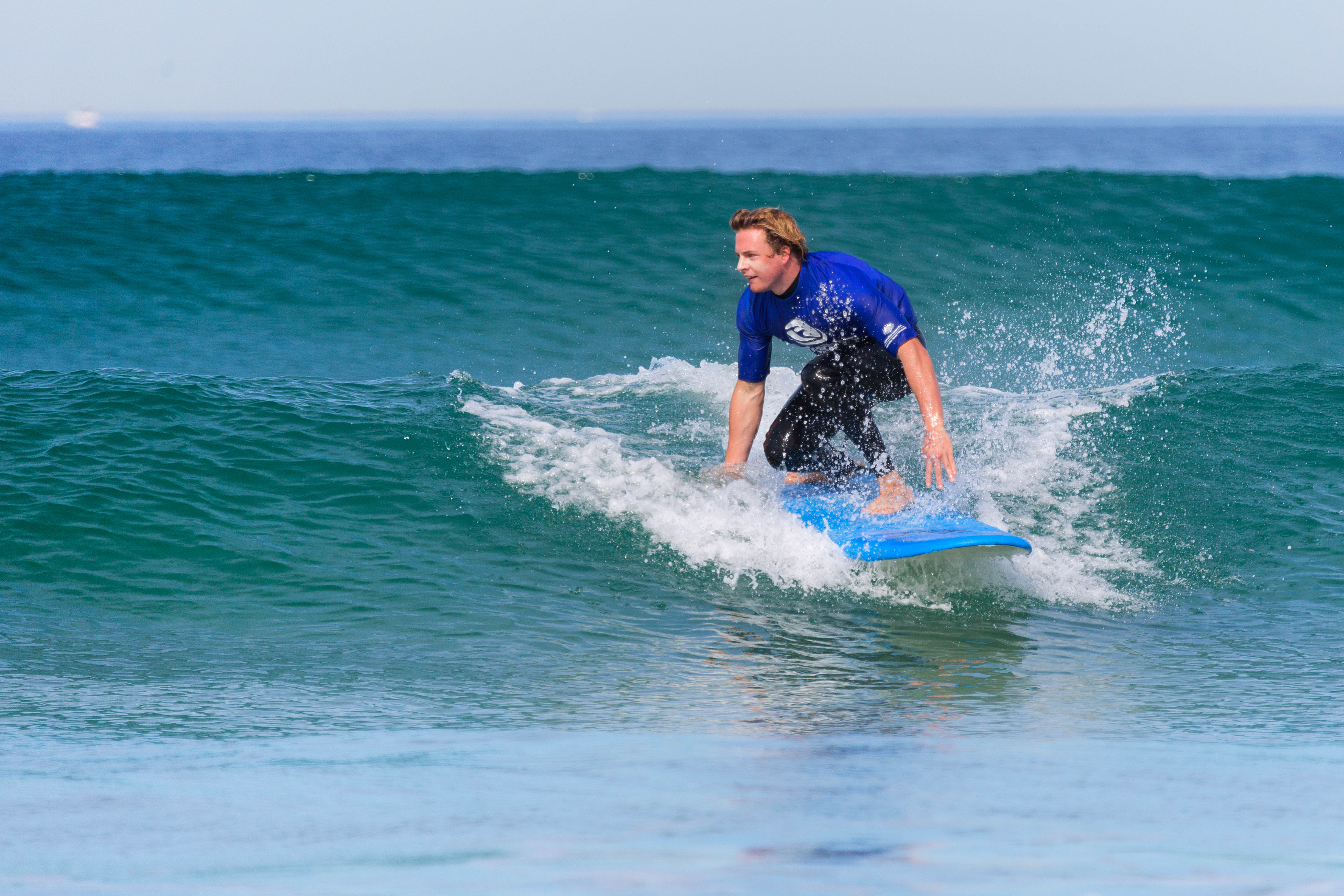 Photo of a man surfing
