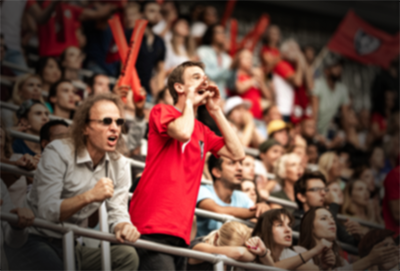 C4S-image-Group of fans cheering while watching match in stadium