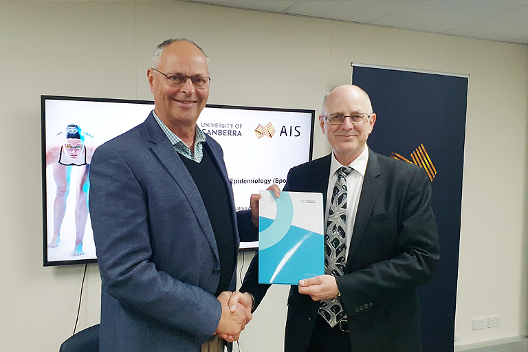 AIS CEO Peter Conde and University of Canberra Deputy Vice-Chancellor (Academic), Professor Geoffrey Crisp