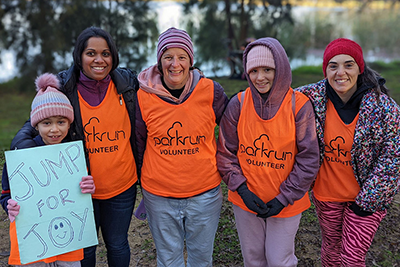 C4S-image-Five female volunteers from Ginninderra parkrun in Canberra, smiling at the camera