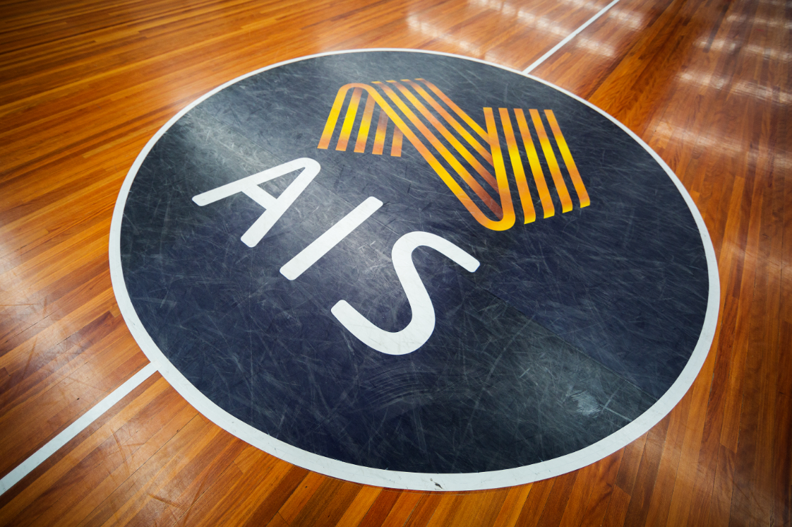AIS logo on basketball court