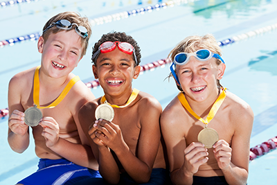 Boys with swimming medals