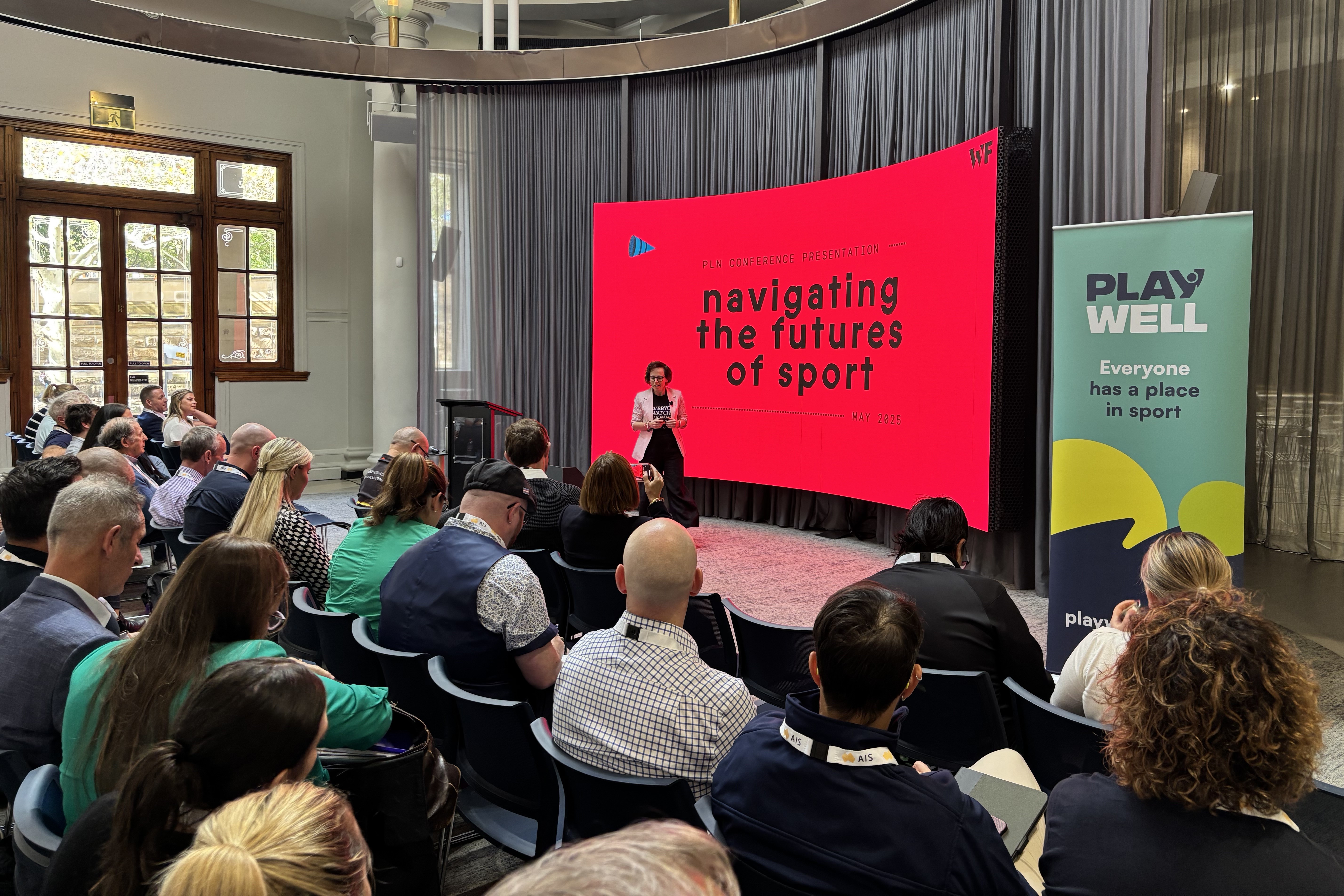 Attendees of the 2025 Participation Leaders Network Conference sit listening to a presentation from Futurist and former Australian cricketer Reanna Browne.