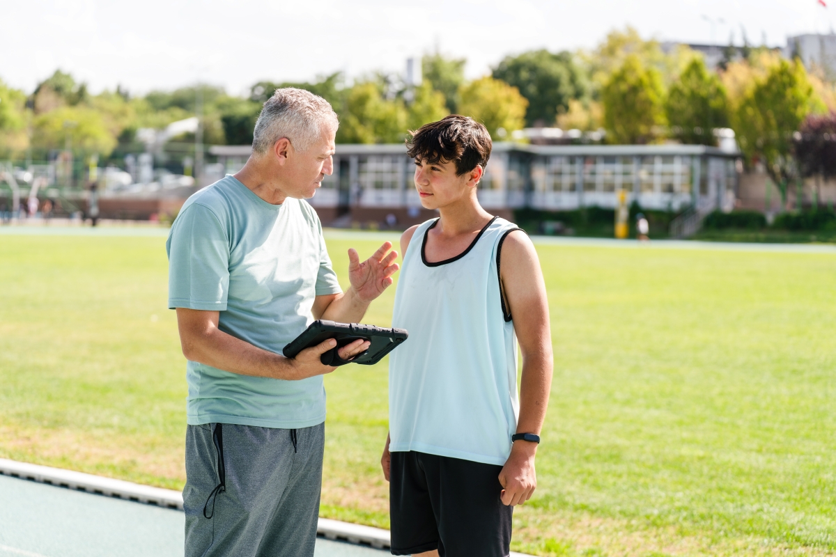 Coach talking to participant