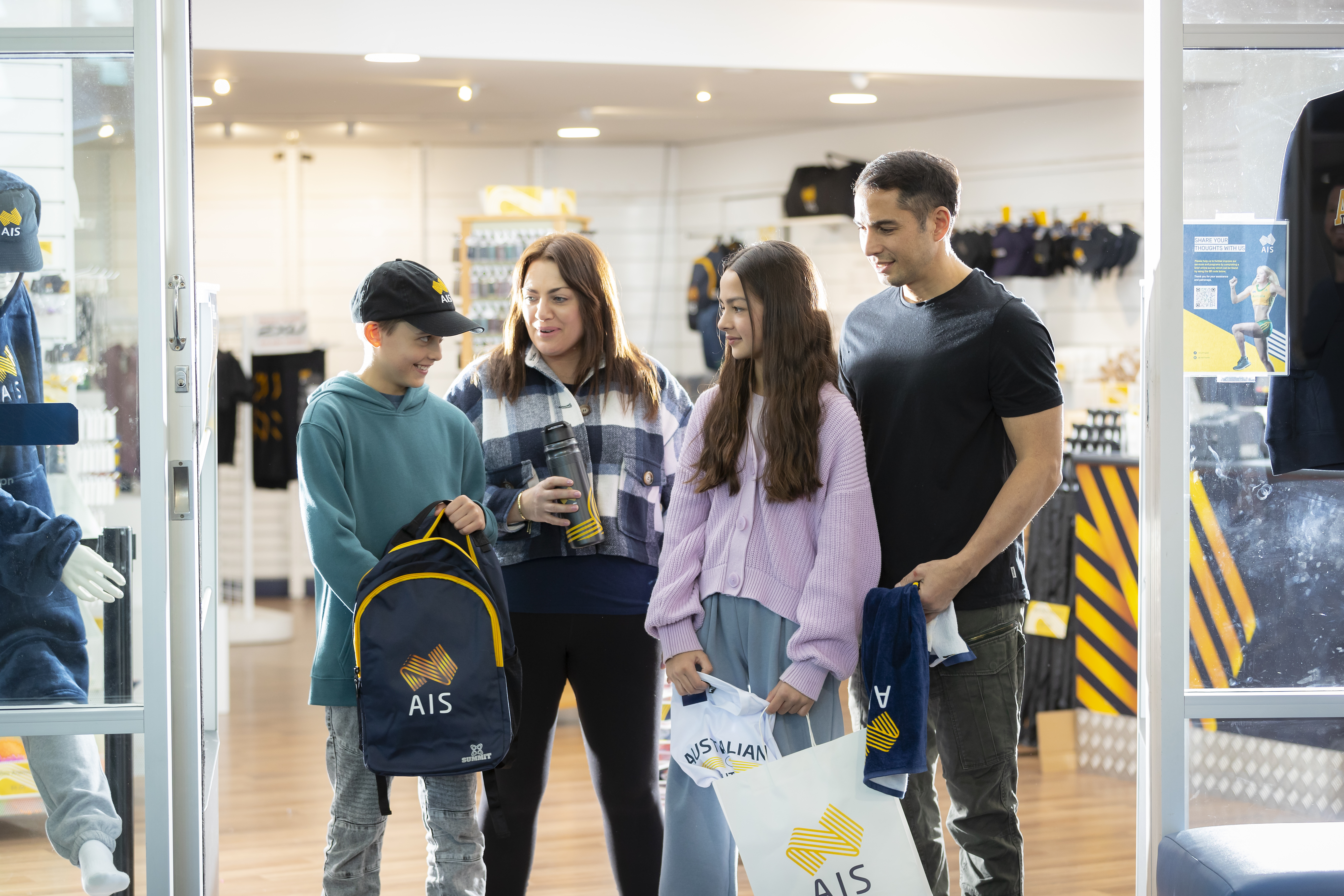 Family shopping at the AIS Shop