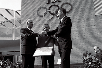 Unveiling of Olympic Rings on Administration Building Professor John Bloomfield, Phil Coles, Kevan Gosper