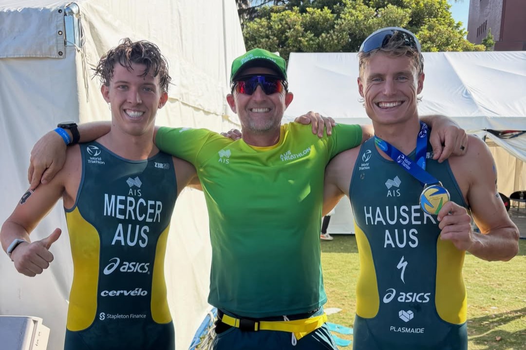 Australian triathlon coach Dan Atkins with Brayden Mercer and Matt Hauser