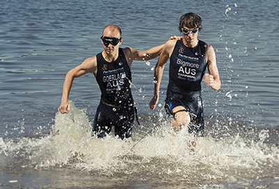 C4S-image-Para-Triathlete and his guide running out of the water after the swim leg
