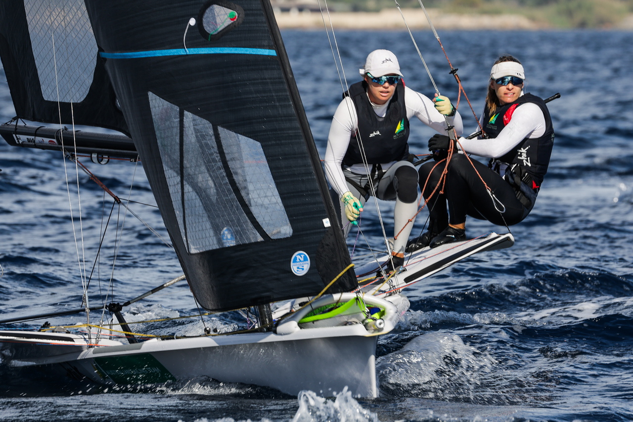 Laura Harding and Annie Wilmot in action, sailing on the water