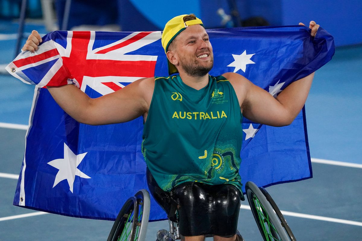 Dylan Alcott with flag