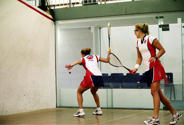 Two Sqush athletes training