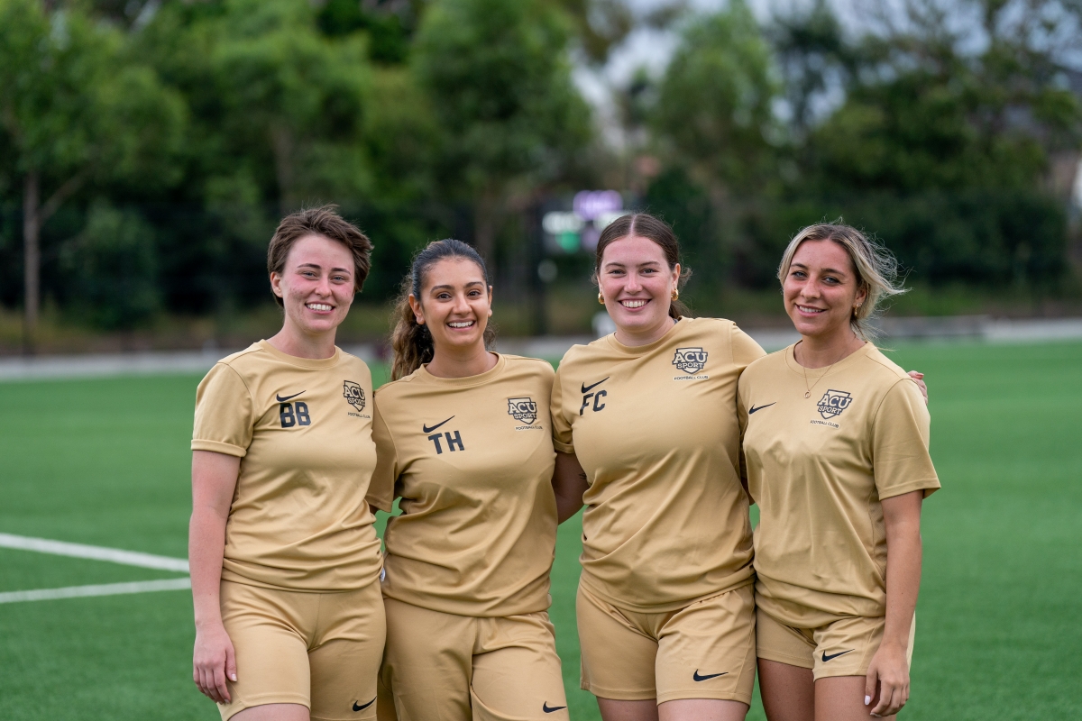 Four committee members from the Australian Catholic University Football Club