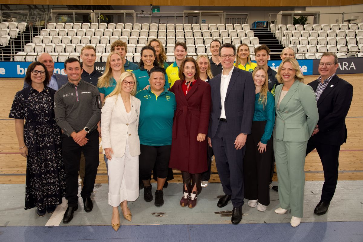 The Minister for Sport The Hon Anika Wells pictured with Australian athletes and sport leaders at the Anna Meares Velodrome in Brisbane.