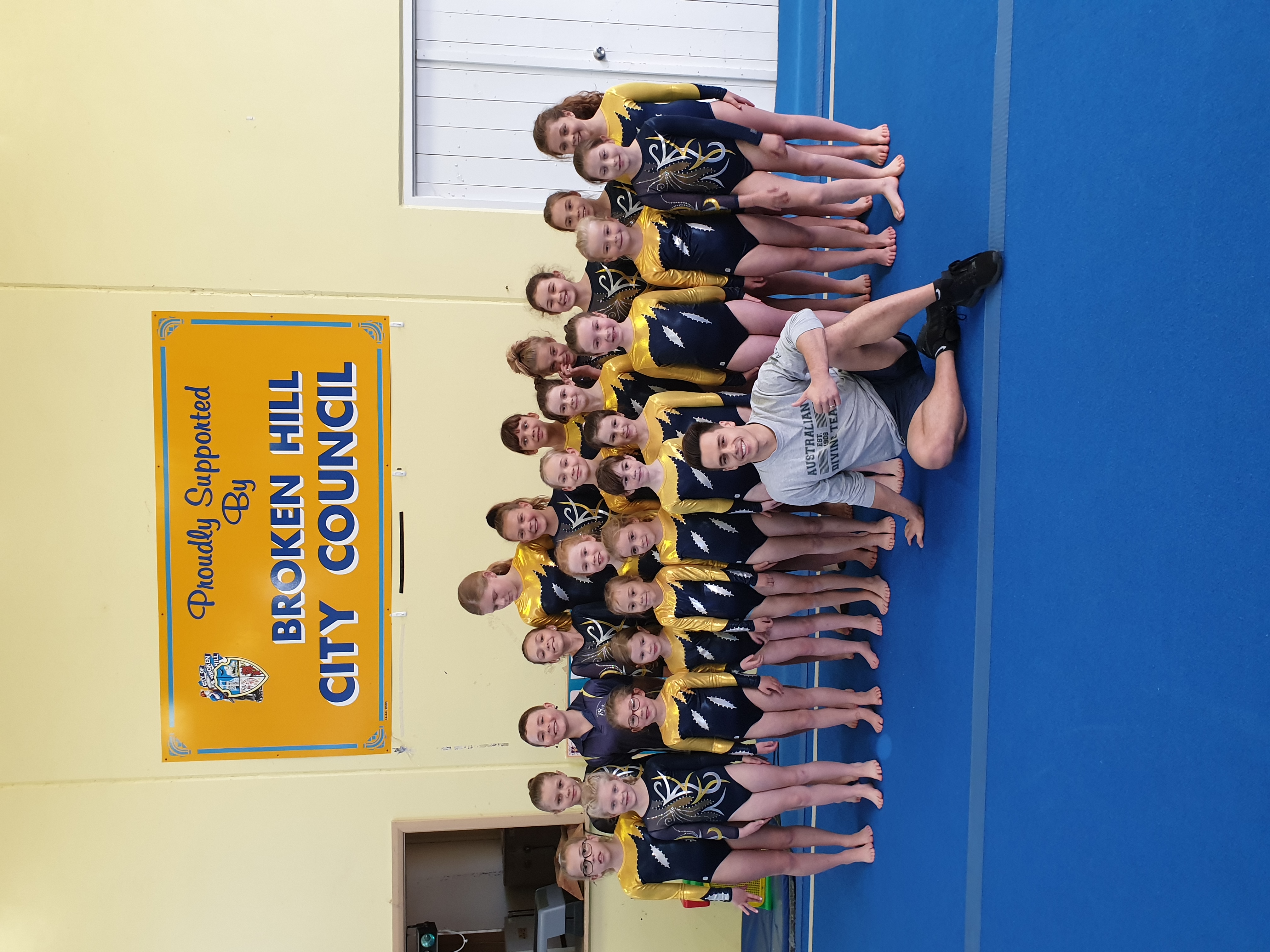 Declan Stacey with gymnasts at Broken Hill.