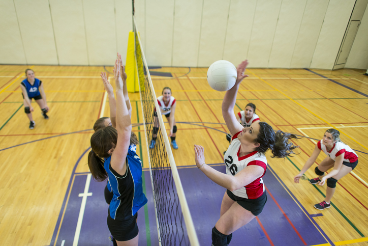 High schools girls playing volleyball