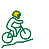 A person riding a mountain bike up a hill