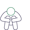 A person sitting on the ground with their head lowered