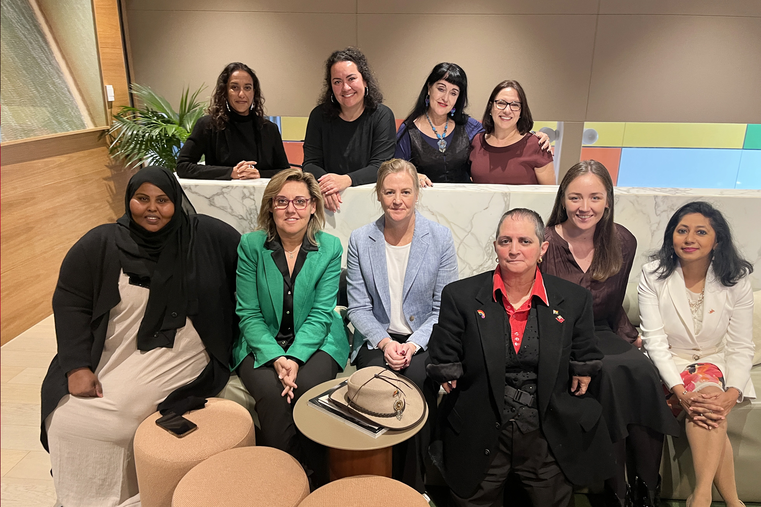 A group of ten people seated together.