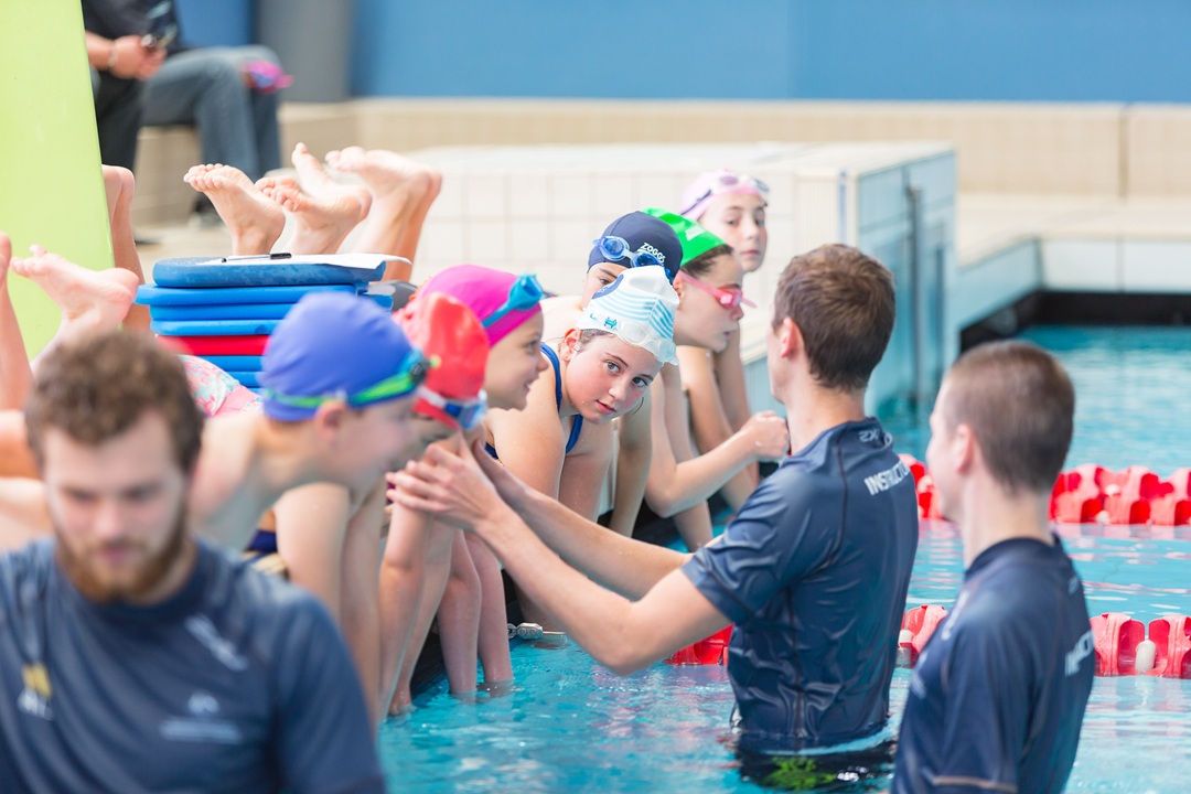 Children learning to swim