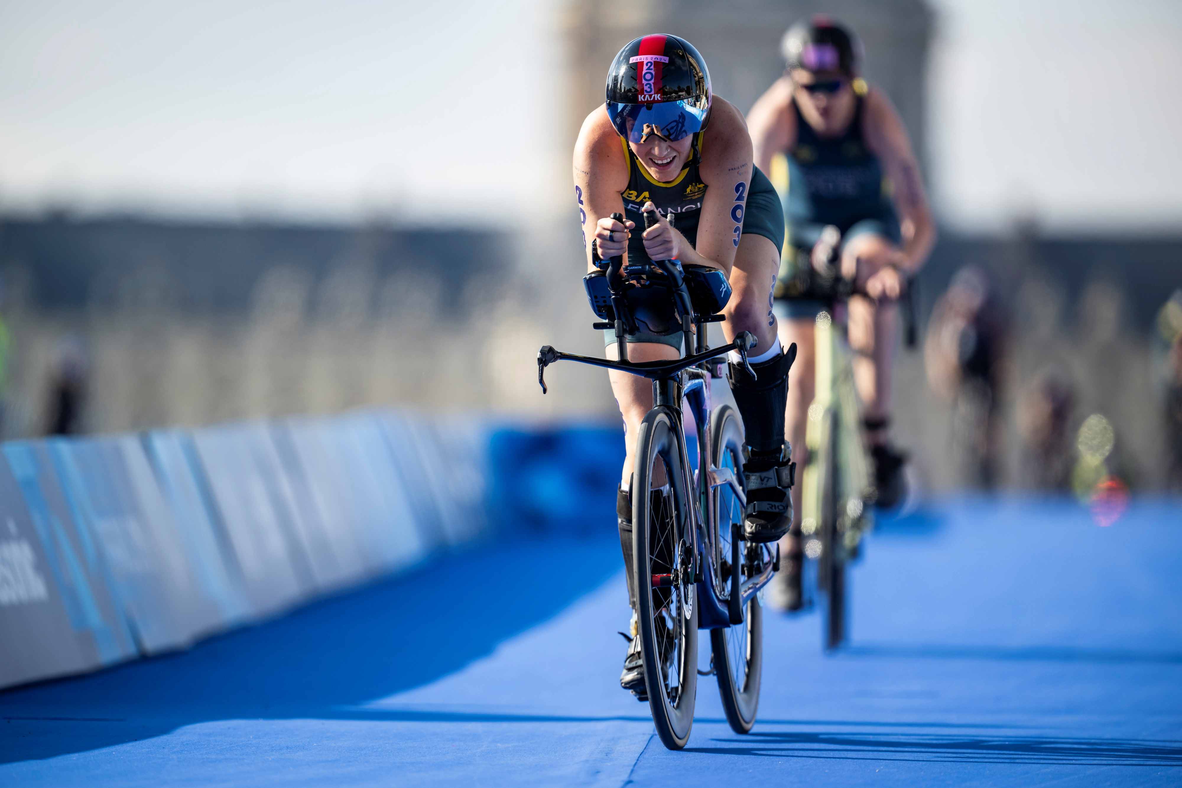 athlete competing in cycling leg of triathon