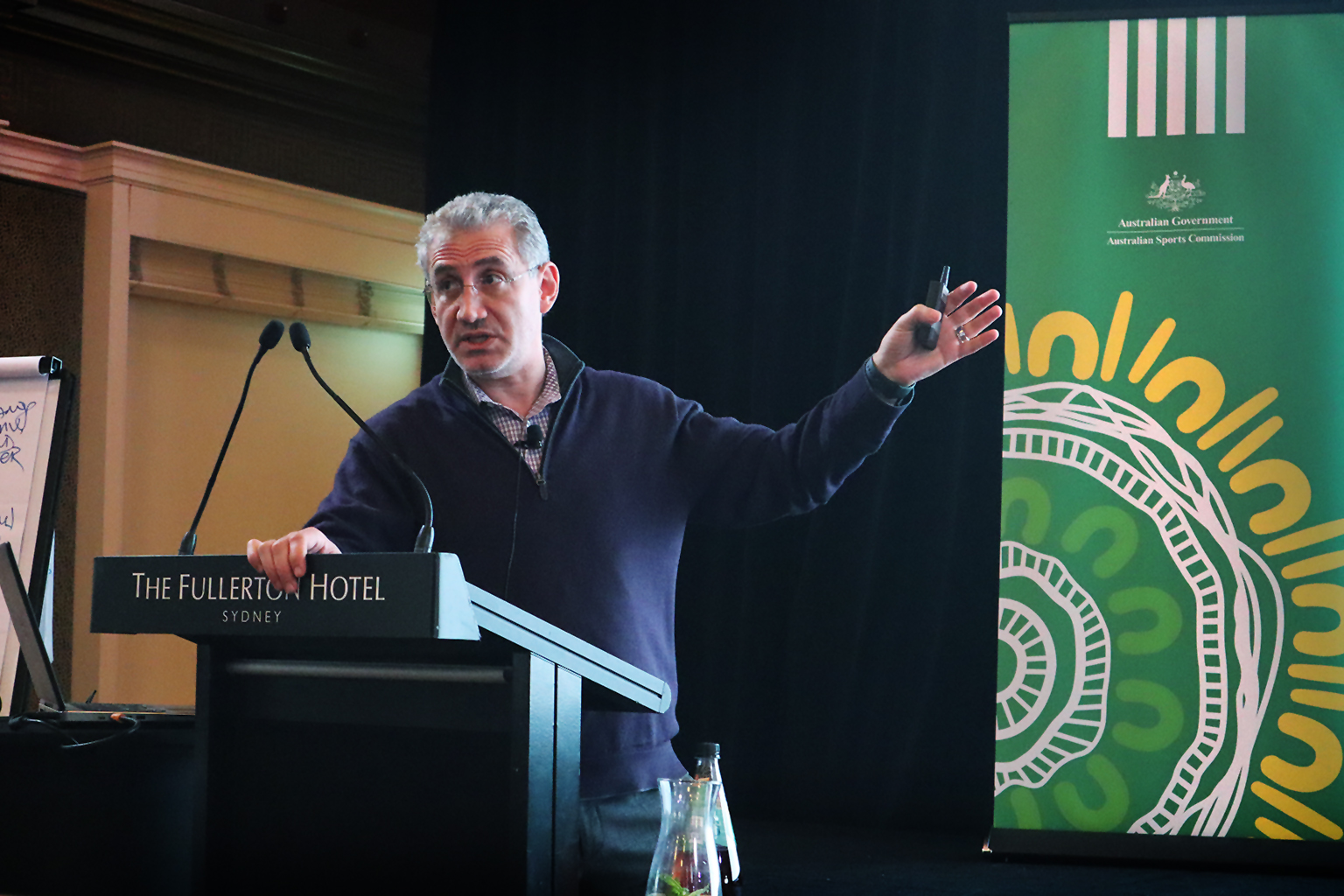 Professor Boris Groysberg presents on stage.