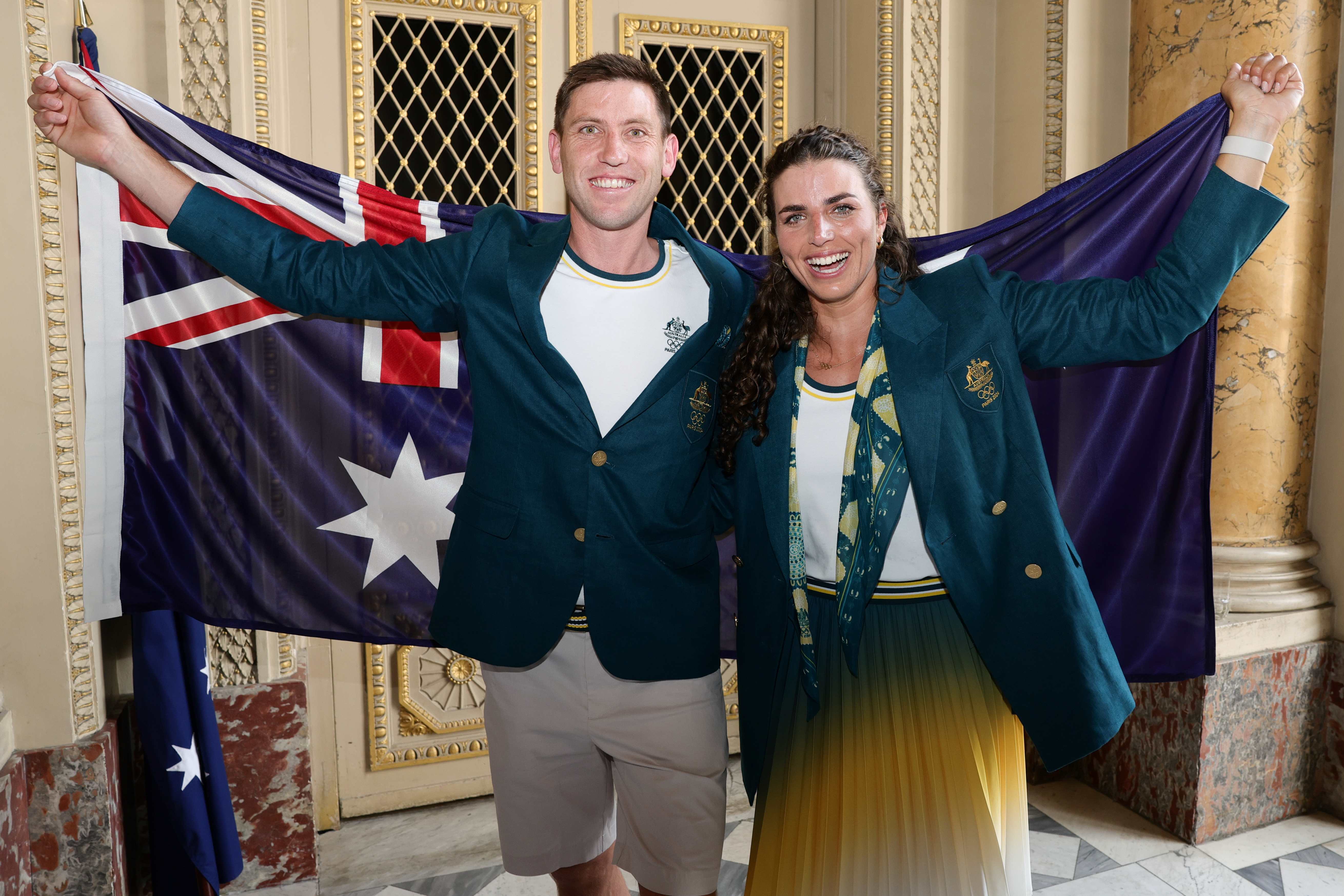 Eddie Ockenden celebrates with fellow Paris 2024 Flag Bearer and Olympian Jess Fox.