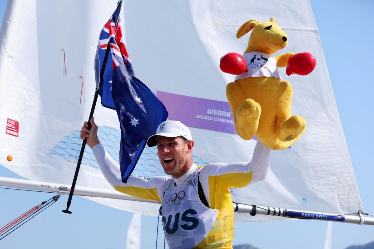Olympian Matt Wearn celebrating with Australian flag after winning the Gold medal at the Olympic Games Paris 2024
