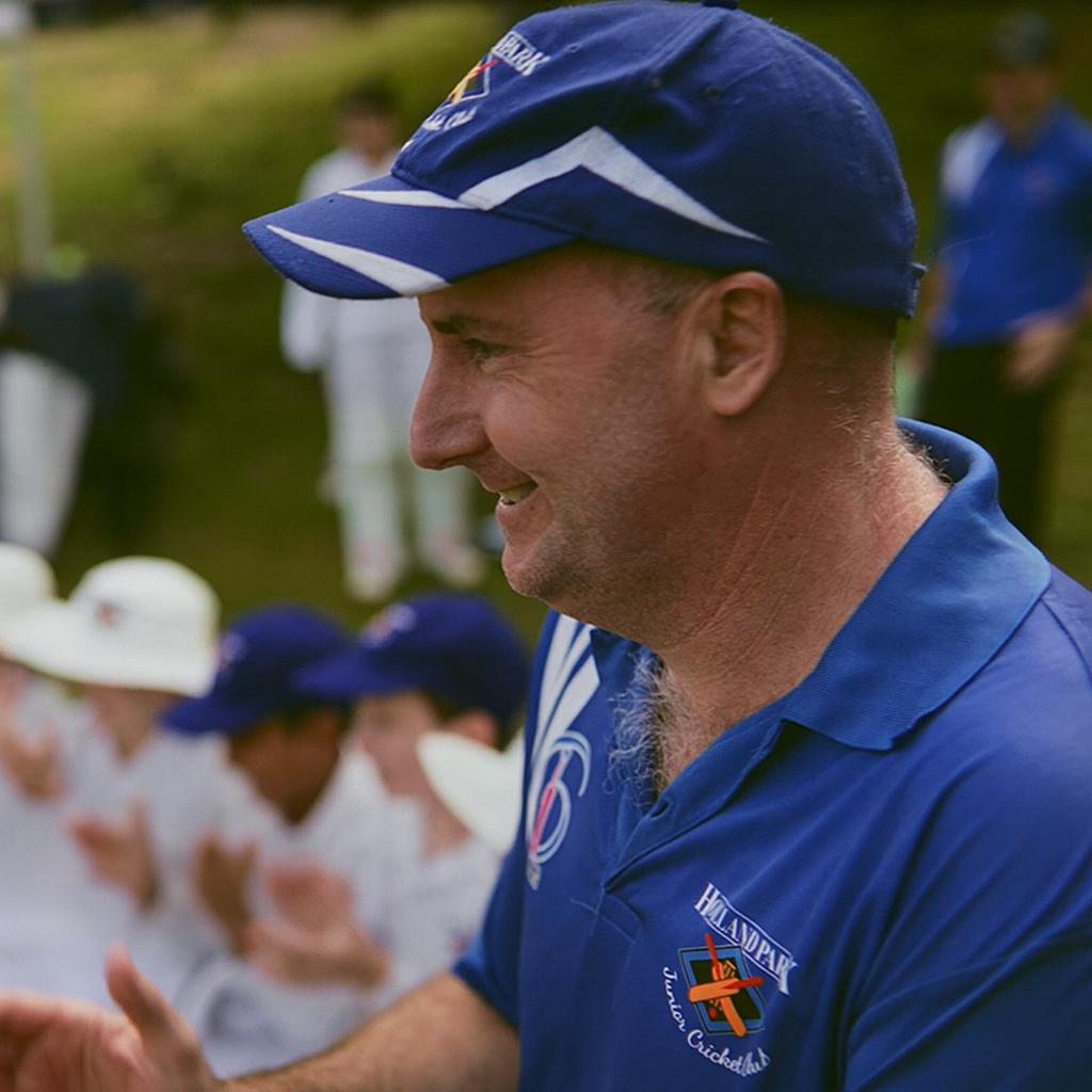 Adam volunteer cricket coach