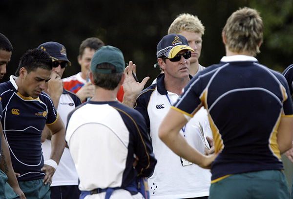 AIS head coach Michael O'Connor speaking to the athletes