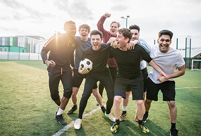 C4S-evidence-men-in-sport-Winning football team cheering