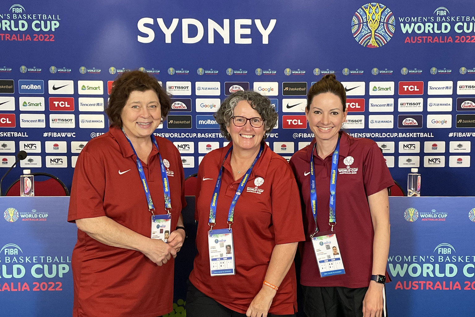 Amanda Jones, right, with volunteers at the FIBA Women's Basketball World Cup.