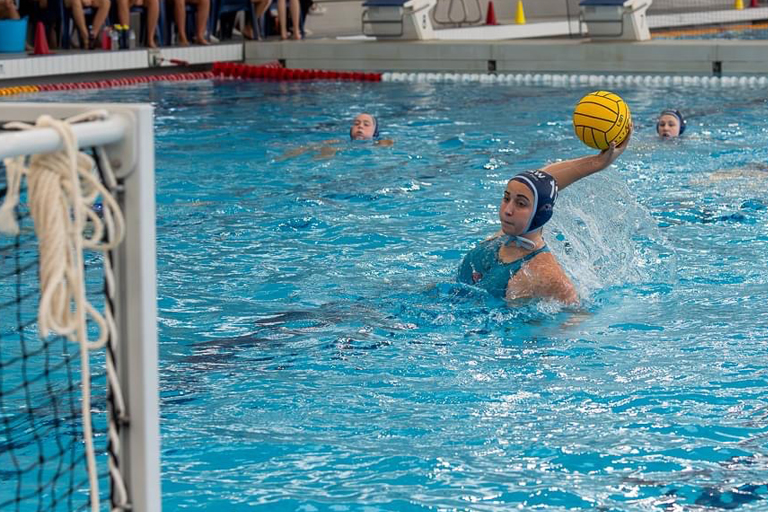 A player lines up a shot during Water Polo Australia's 15&U and 17&U National State Championships at the AIS. Photo: Water Polo Australia