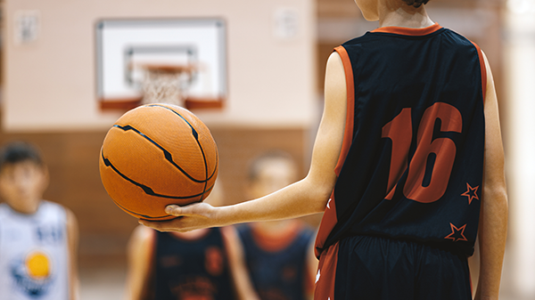 Young boy holding a basketball