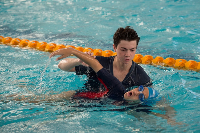 The above picture shows a swimmer with the head and shoulder rolled to the side to allow for an effective breath.
