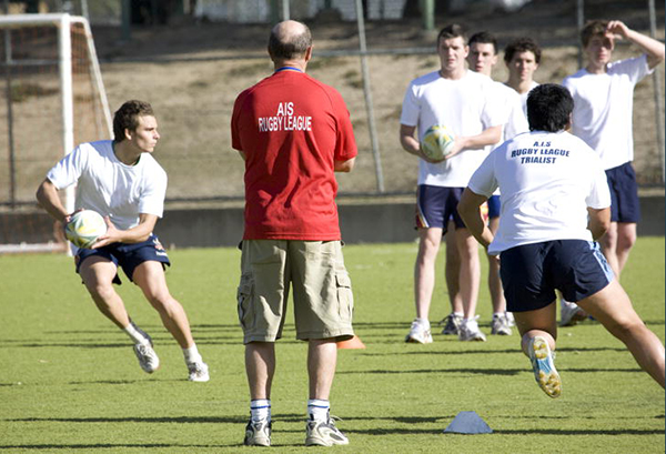 AIS coach watching Rugby League athletes training