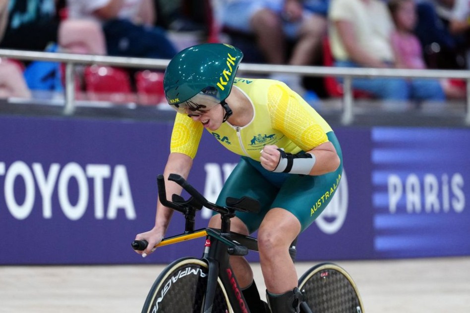 Amanda Reid celebrating after winning the gold medal of the Women's C1-3 500m Time Trial Final during the Paris 2024 Paralympic Games.