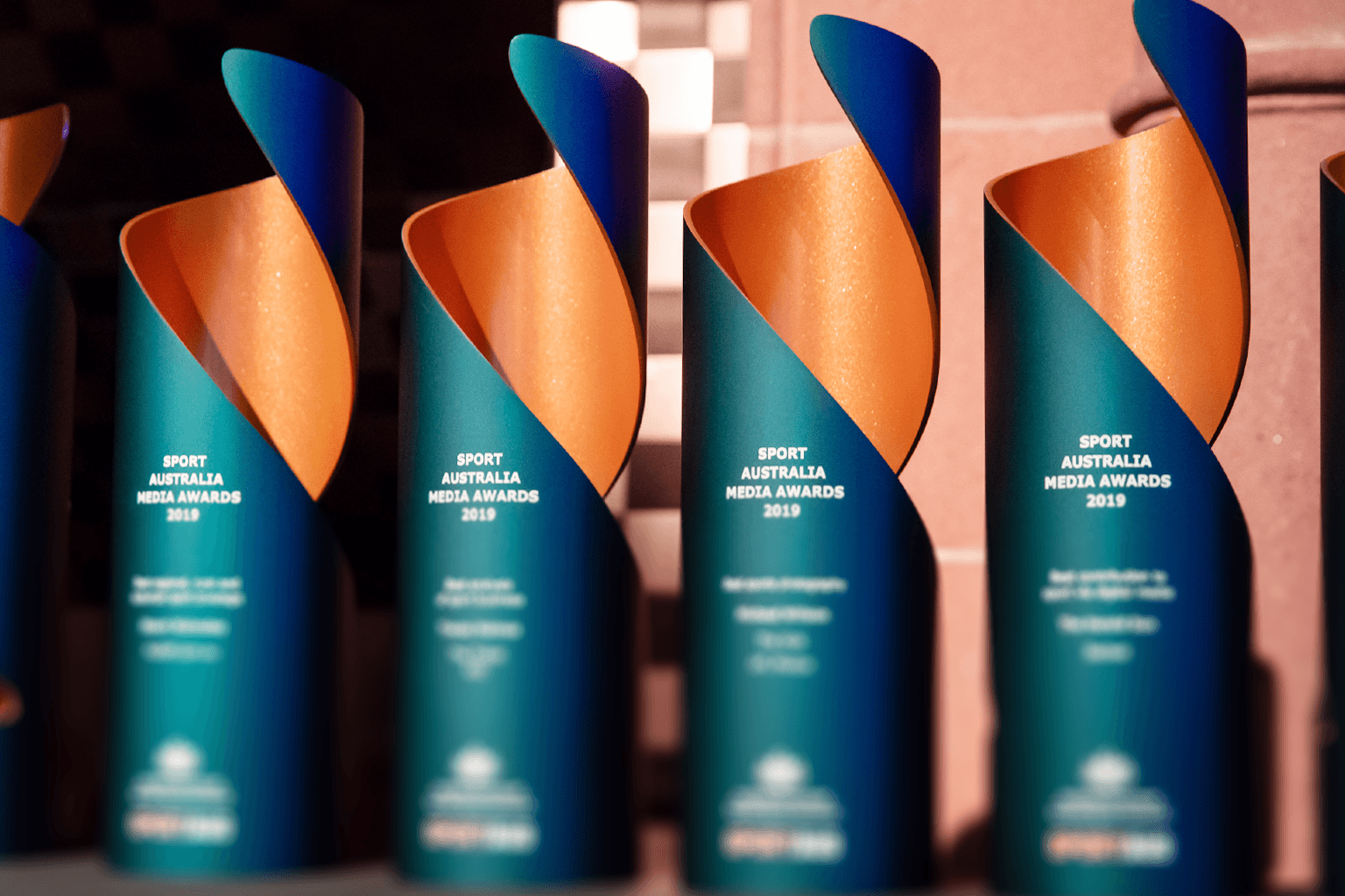 Four Media Awards Trophies