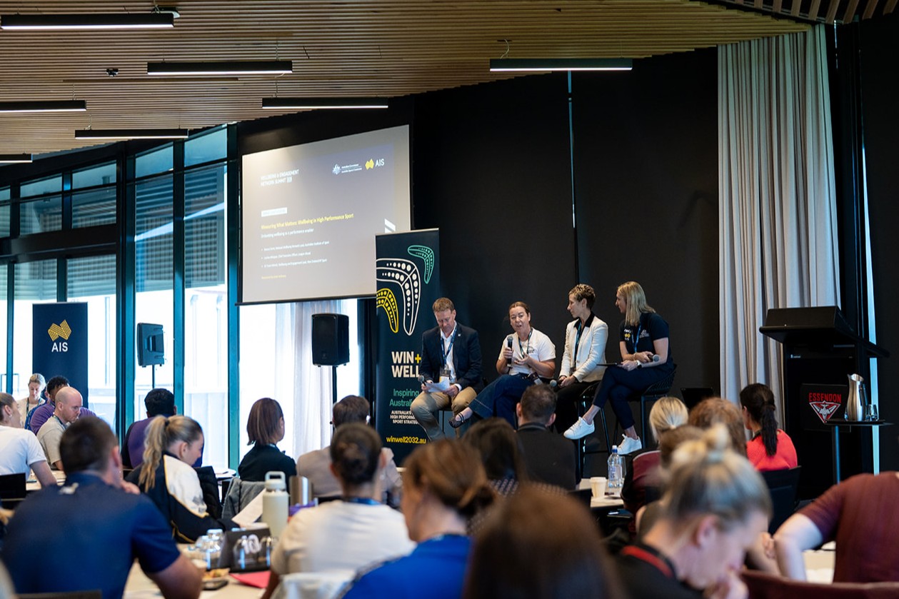 Room full of guests listening to presenters at the AIS Wellbeing and Engagement Network Summit 2026