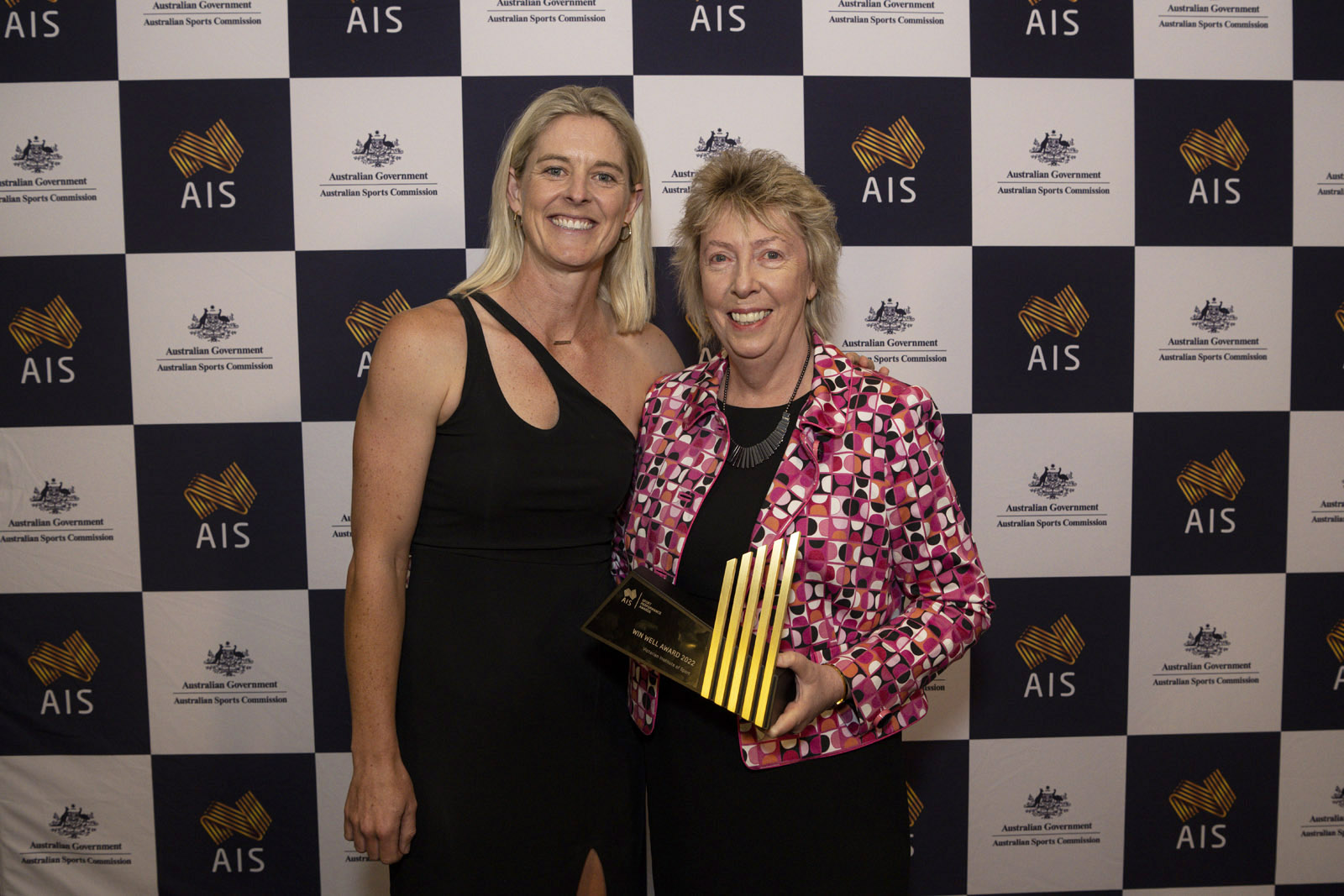 Former Victorian Insititue of Sport scholarship holder Rachael Lynch and VIS CEO Anne Marie Harrison with the Win Well Award.