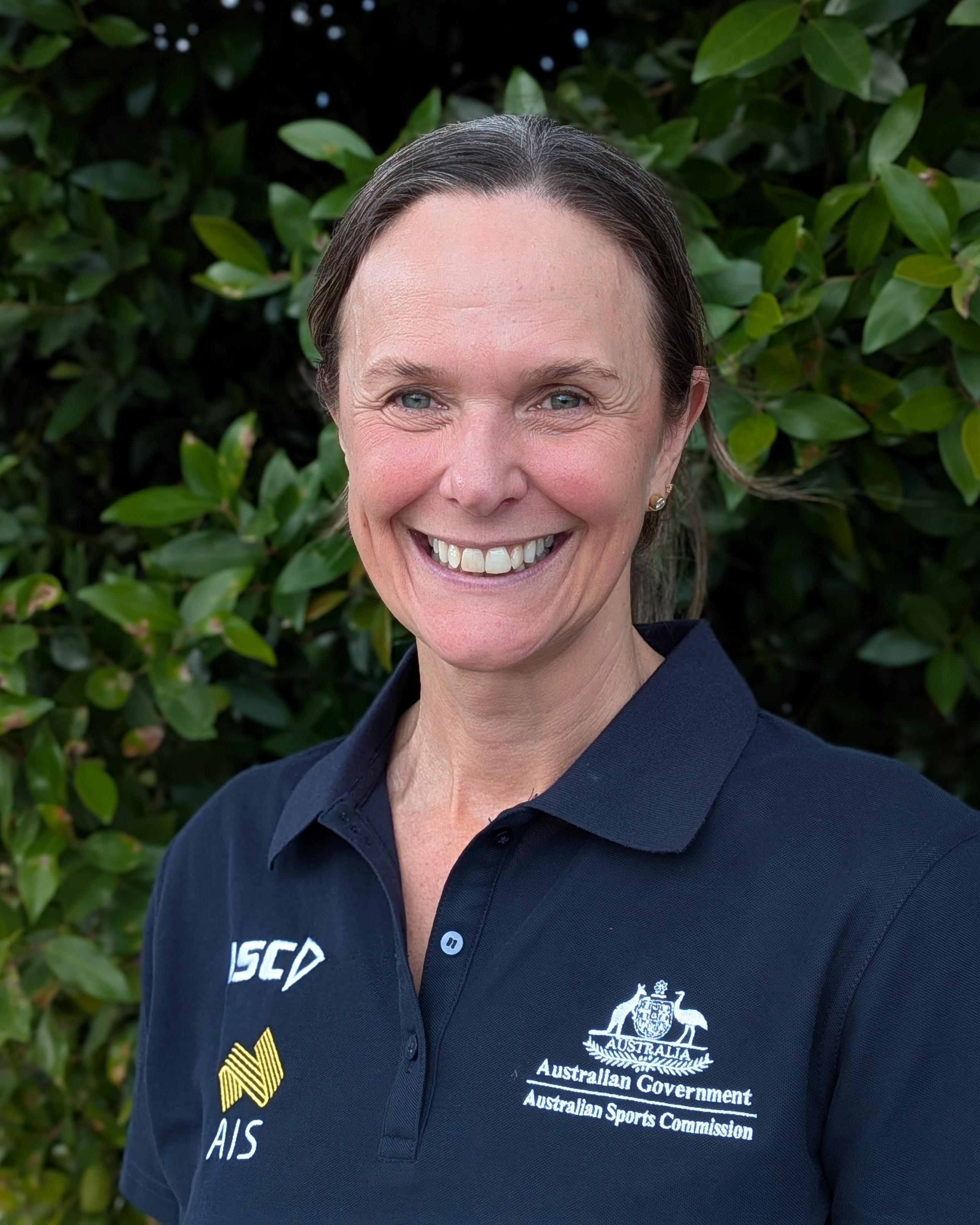 Headshot of Alison Low wearing AIS polo
