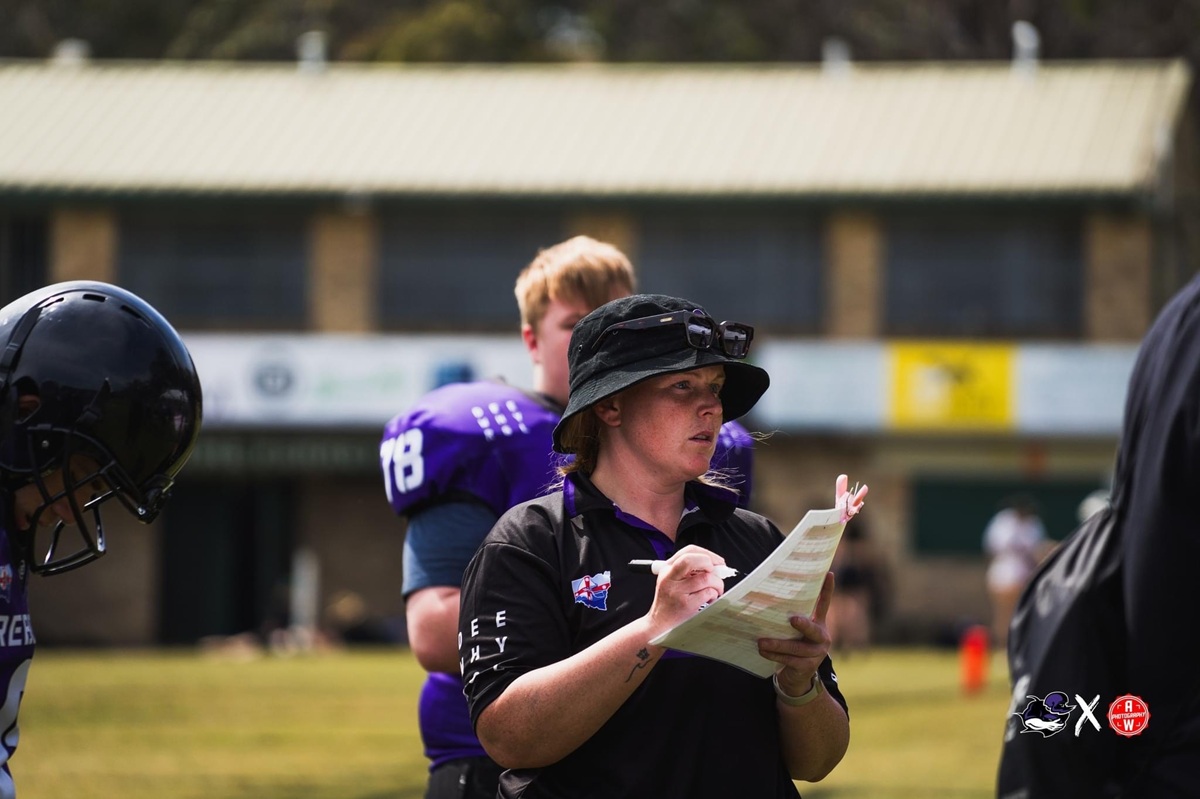 Brooke Mugridge in action coaching Flag Football