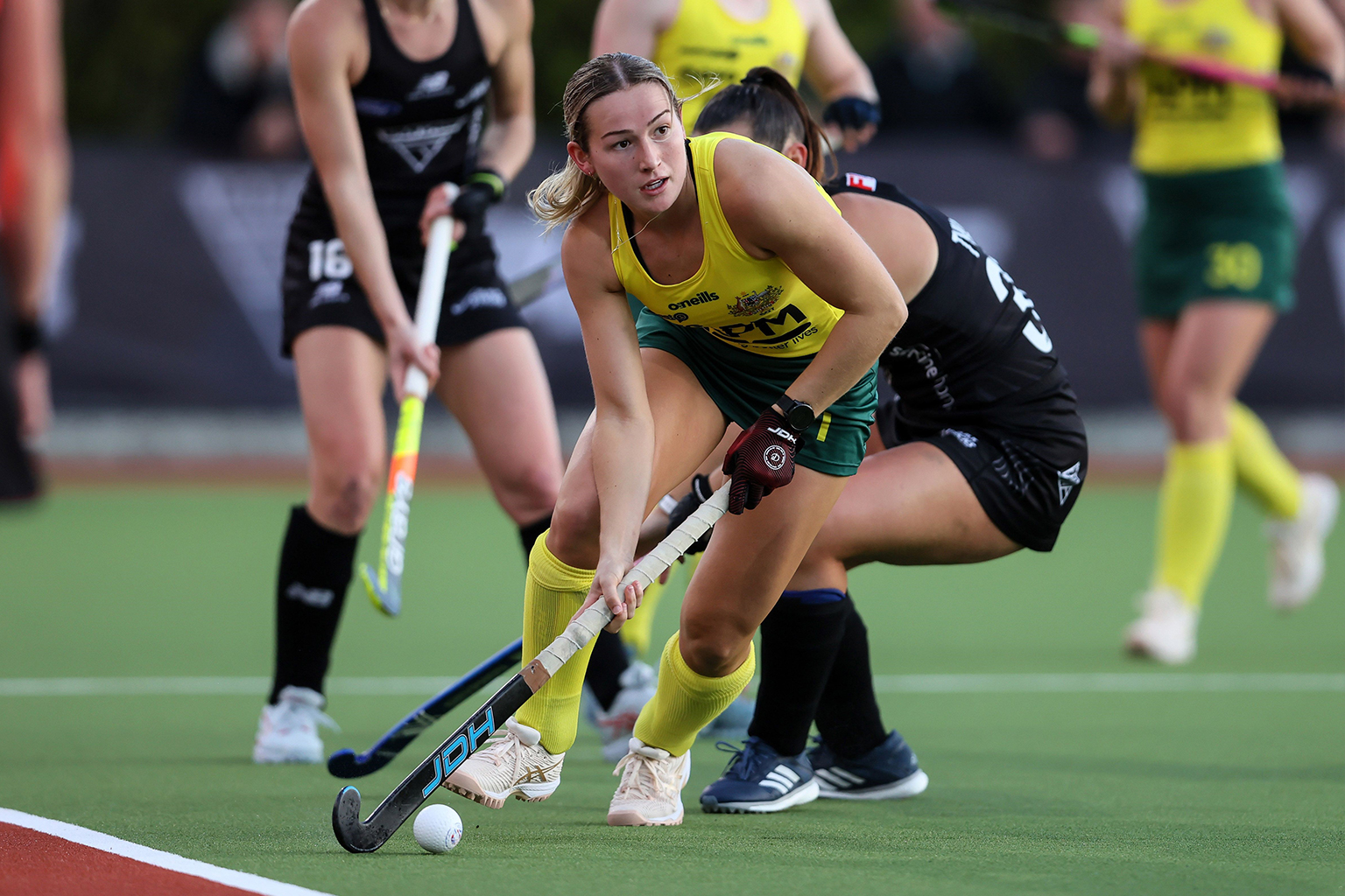 A hockey player hits the ball