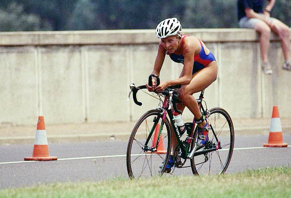 Female triathlete racing during the cycling leg