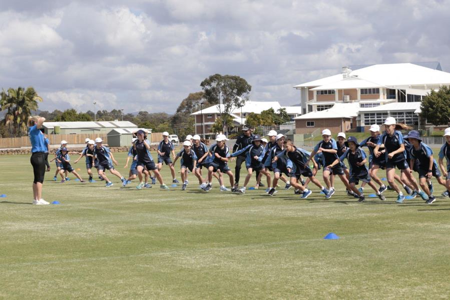 Sporting Schools - Secondary Students running on oval