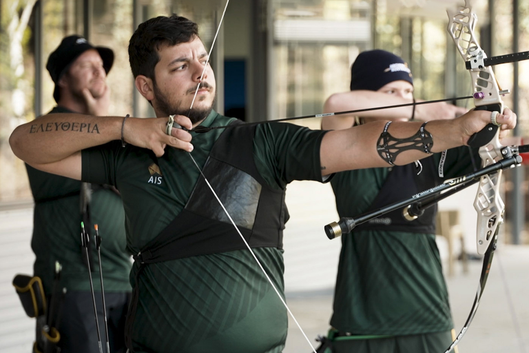 Peter Boukouvalas draws bow.